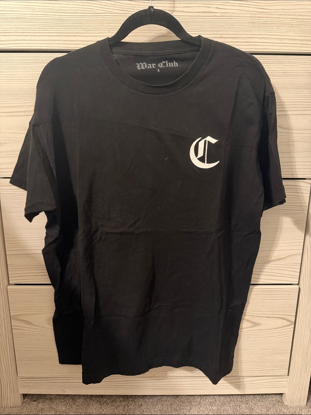 Black Short-Sleeve Tee with White Crest